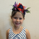 Me with a silk flower headband that I made.